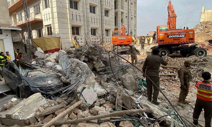 Pakistan mosque blast: 100 confirmed dead